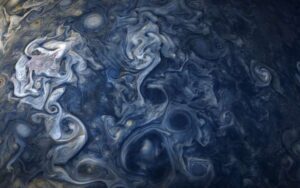 NASA satellite images of cyclones on Jupiter reveal that storms are driven by processes similar to those on Earth